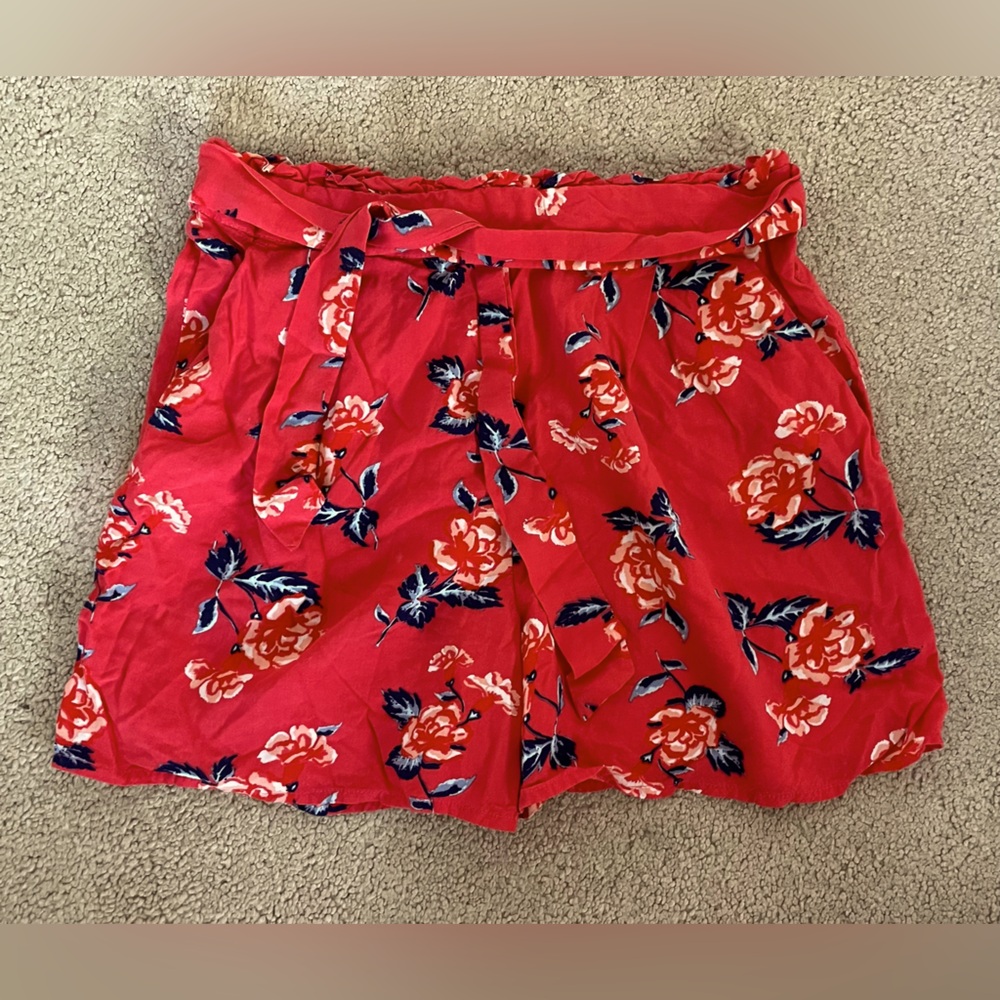Pink with blue flowered shorts